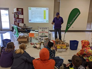 Bill Spiegel educating 4-H members on recycling