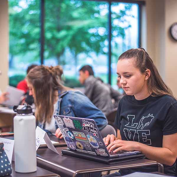 Student in K-State classrom