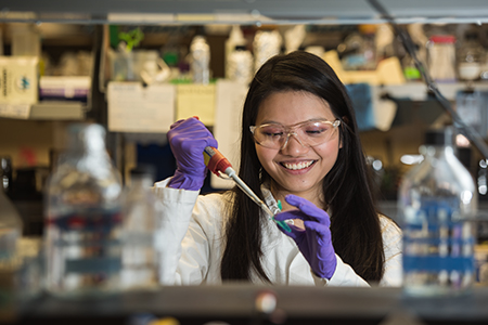 A K-State student works in a lab. 