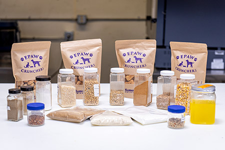 Aldrich and several students prepare K-State-made dog treats and other pet food, which use many kinds of ingredients.