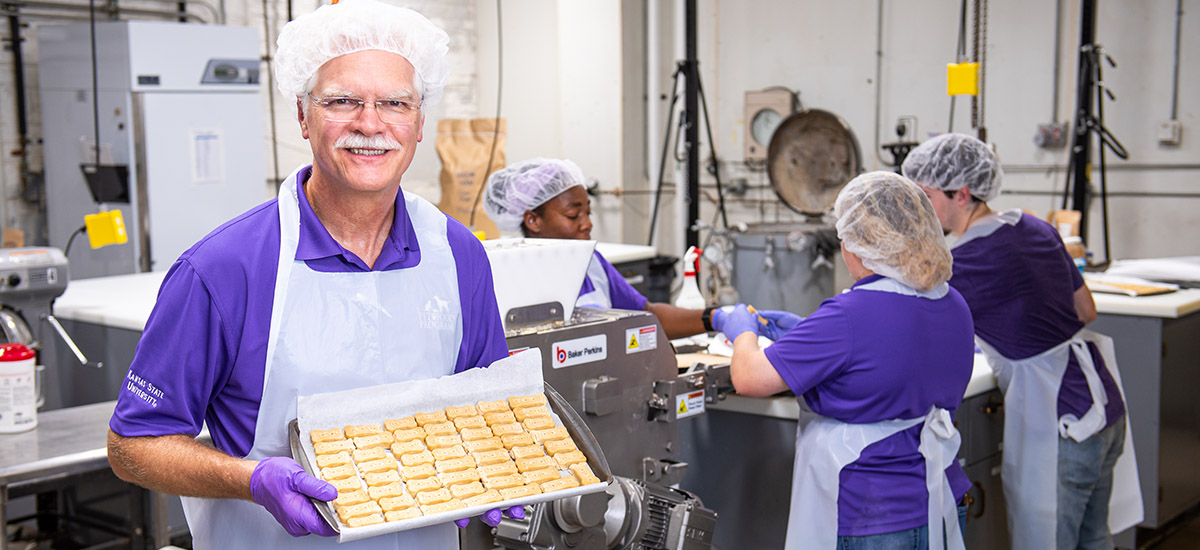 Greg Aldrich researches ways to make dog and cat food more nutritious.