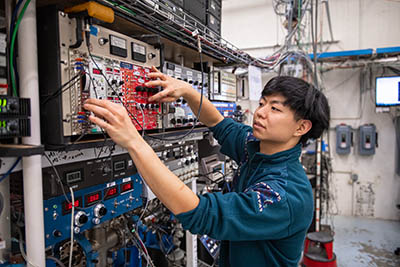 Naoki Iwamoto works on signal processing electronics.