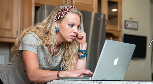 Student working on a laptop computer