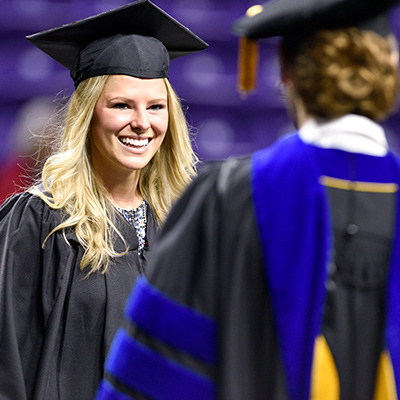 Student walking at graduation