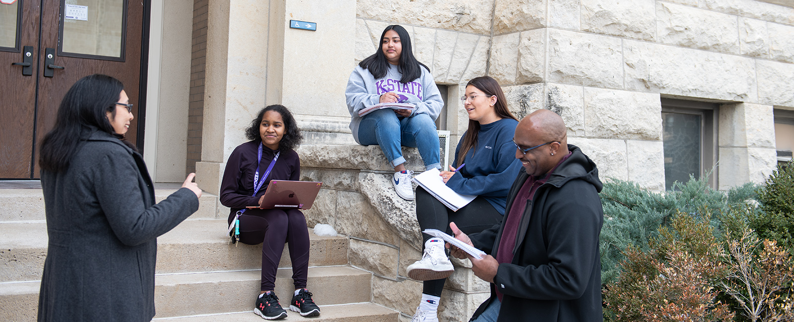 maria's students outside listening in class