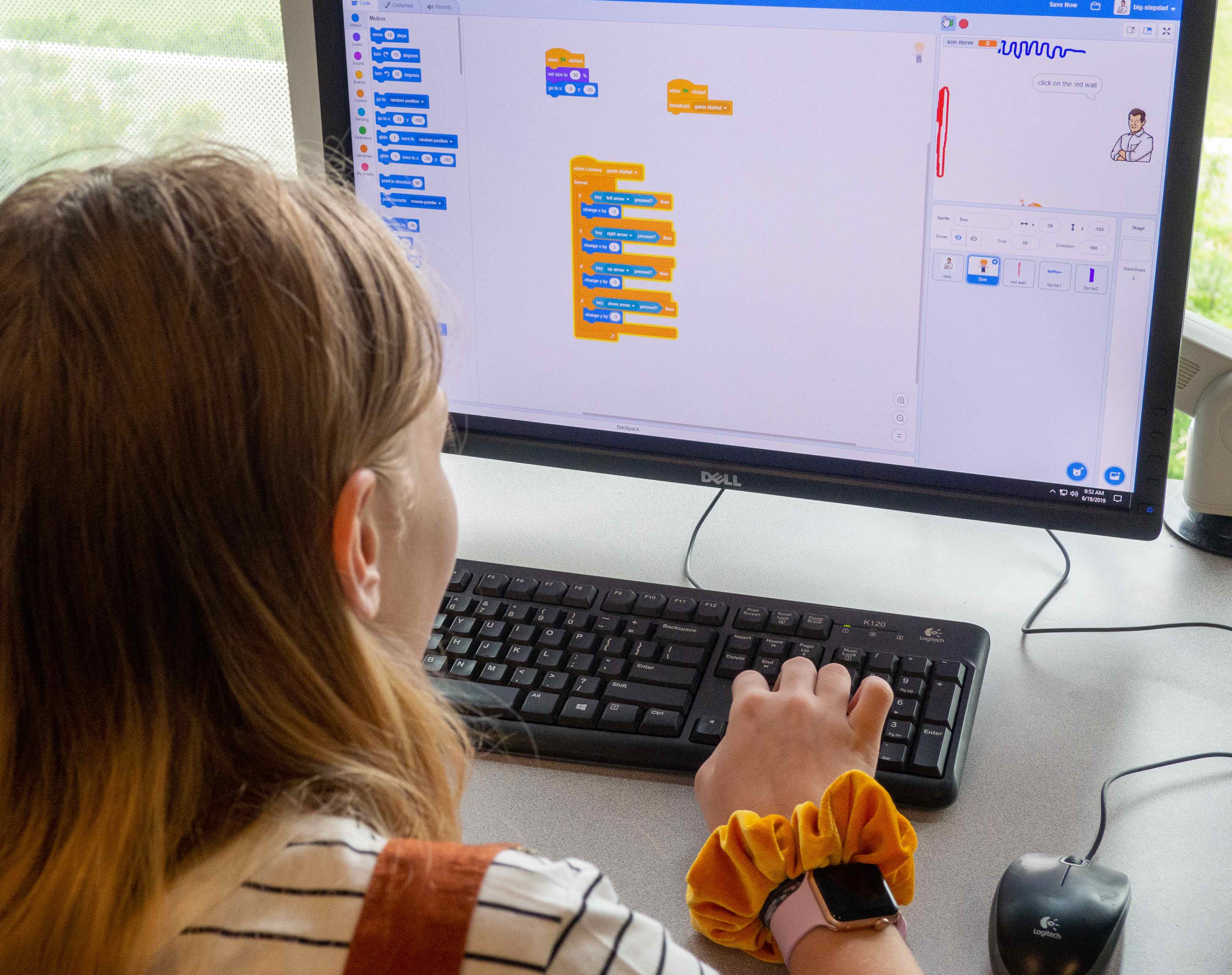 A student working on a STEM project on a computer