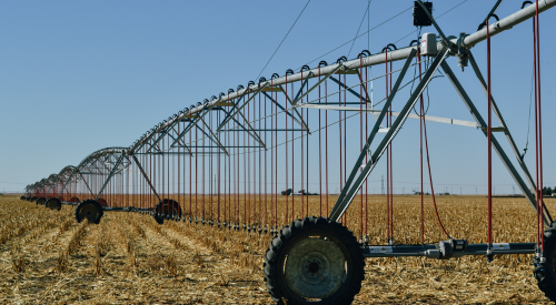 An irrigation pivot at sunrise 