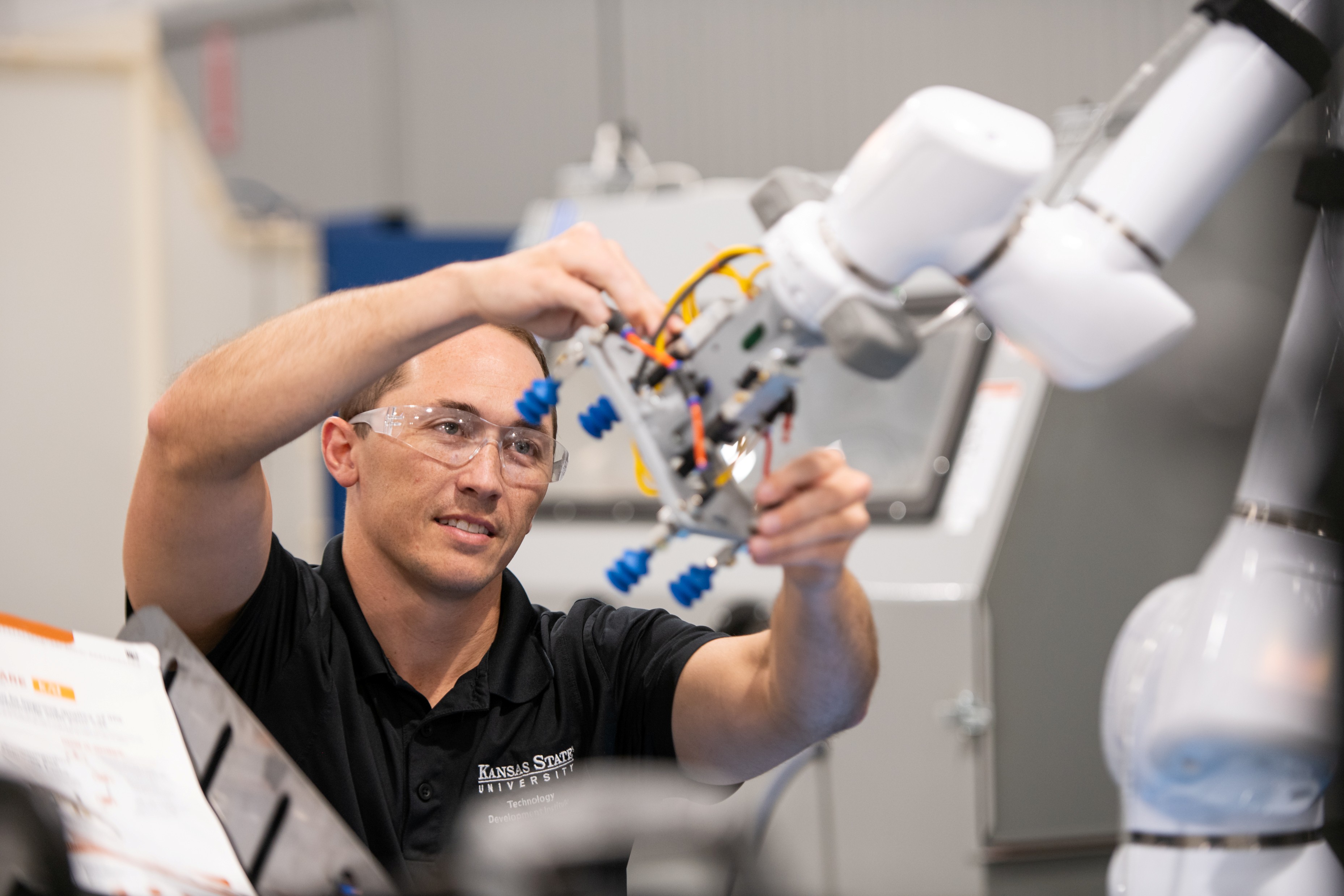 Engineer Using Robot