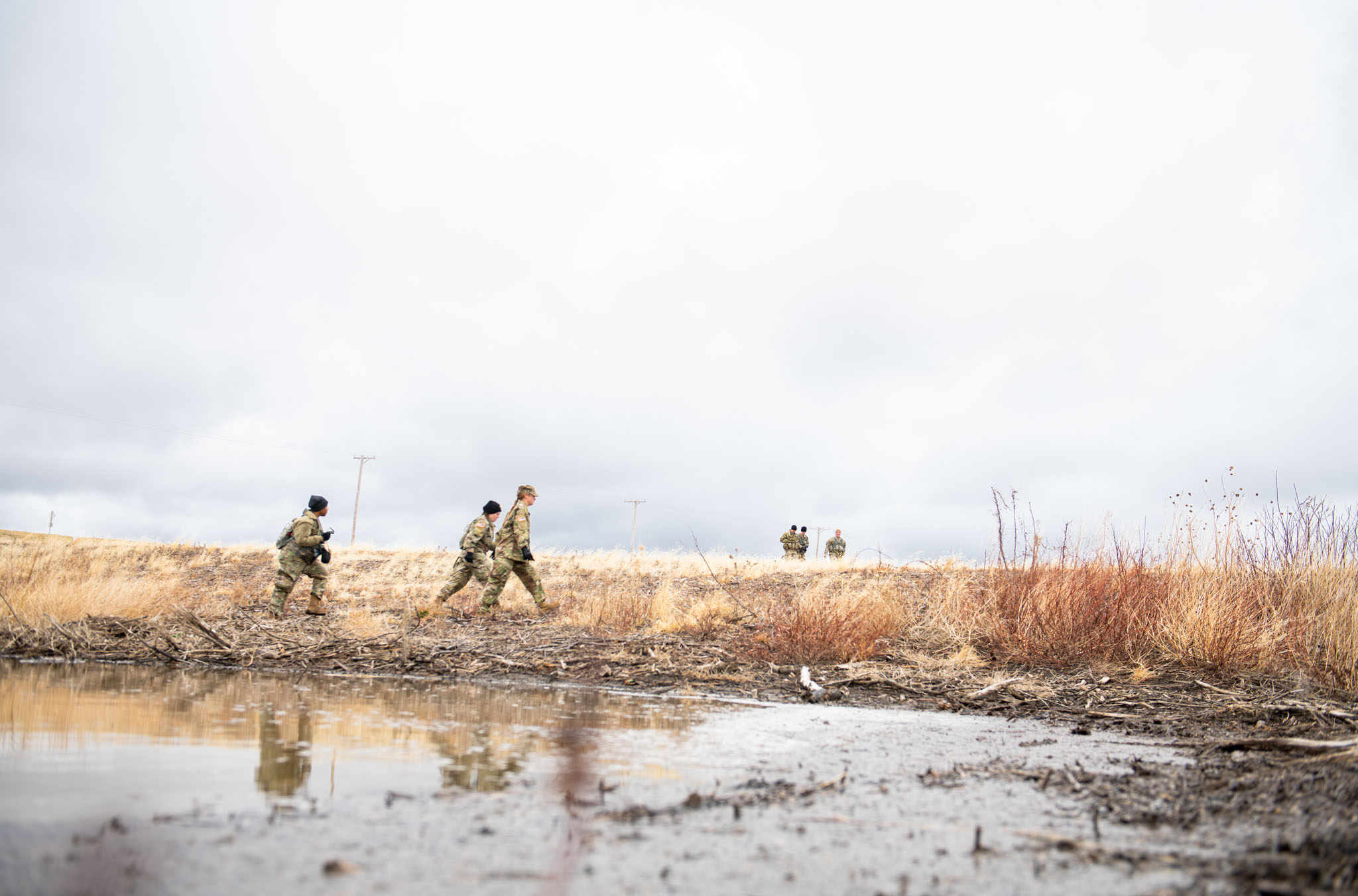 ROTC walking across a field