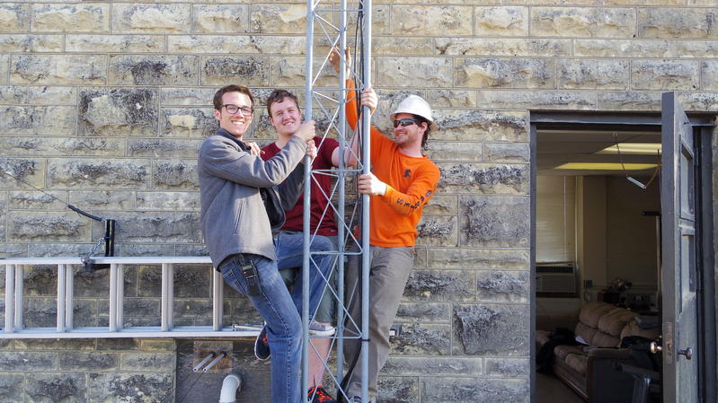 Clube members posing with the tower