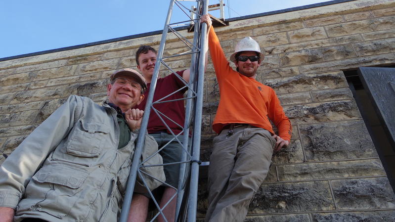 Clube members posing with the tower