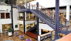 The renovated Courtyard features large staircases connecting the ground, first and second floors.